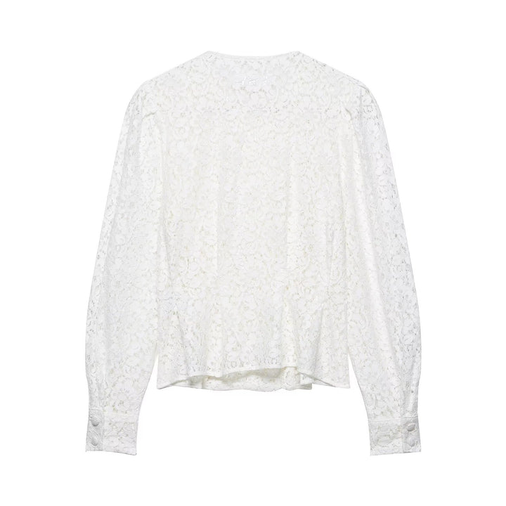 Dame spidsbluse med dekorative knapper og elegant pasform Skovae