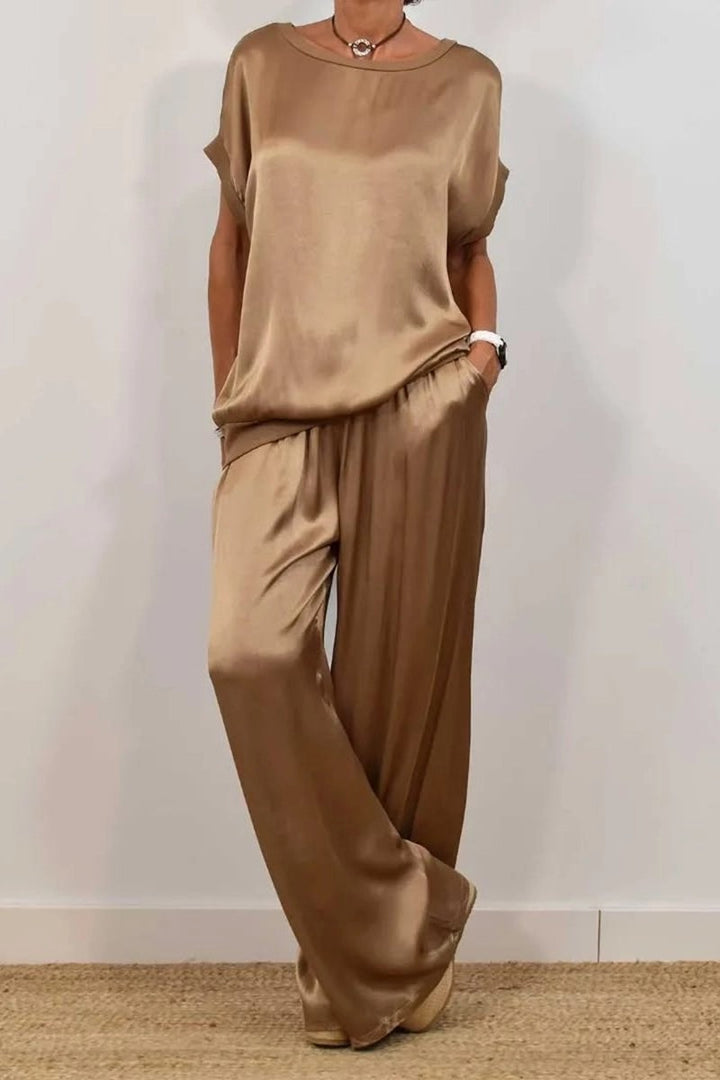 Dame Elegant sæt med afslappet bluse og løst skåret bukser Stilla