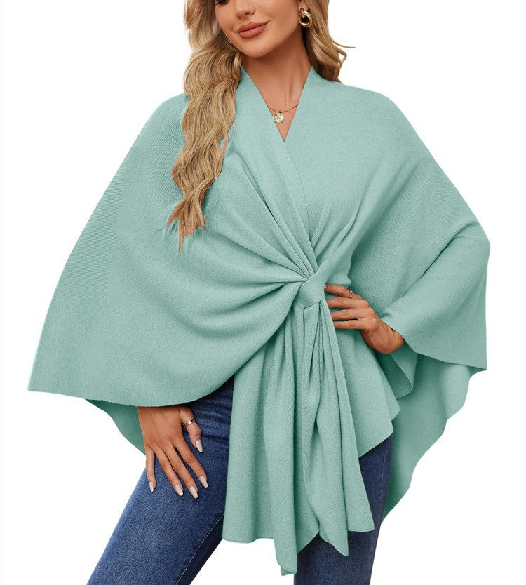 Dame elegant strikkeponcho med raffinerede draperinger og taljebælte Stilla