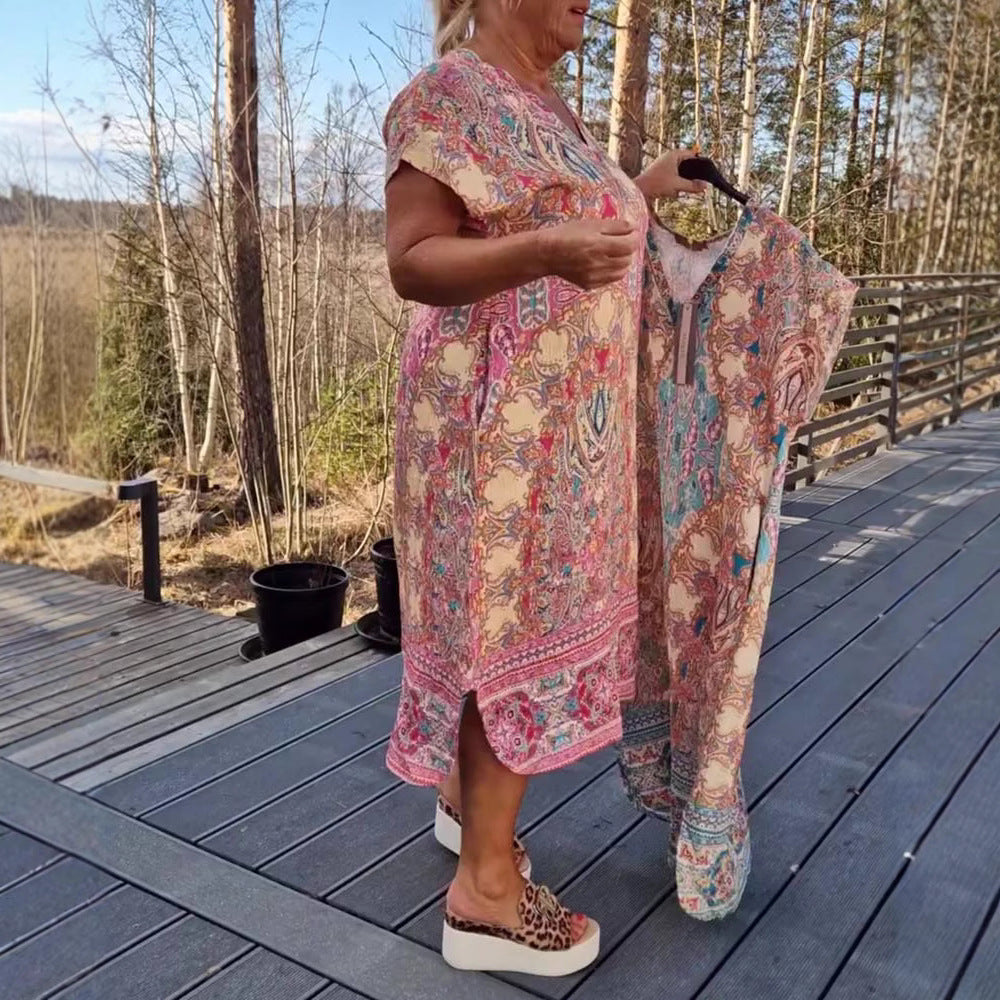 Dame nan luftigt V-halskjole i paisley-print med stiklommer og matchende pareo Skovae