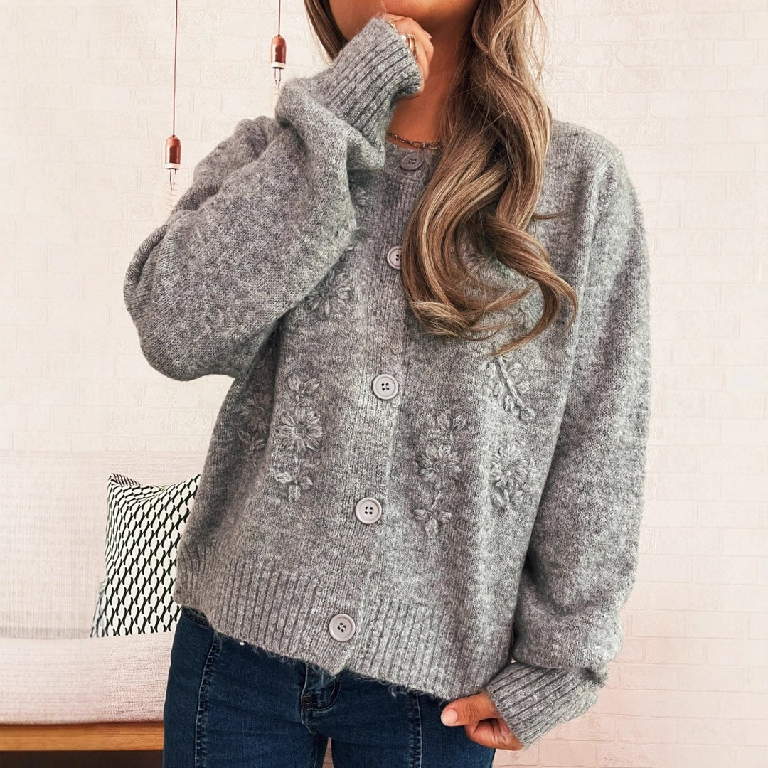 Kvinders løstsiddende strik cardigan med blomsterapplikationer og knapdetaljer Stilla