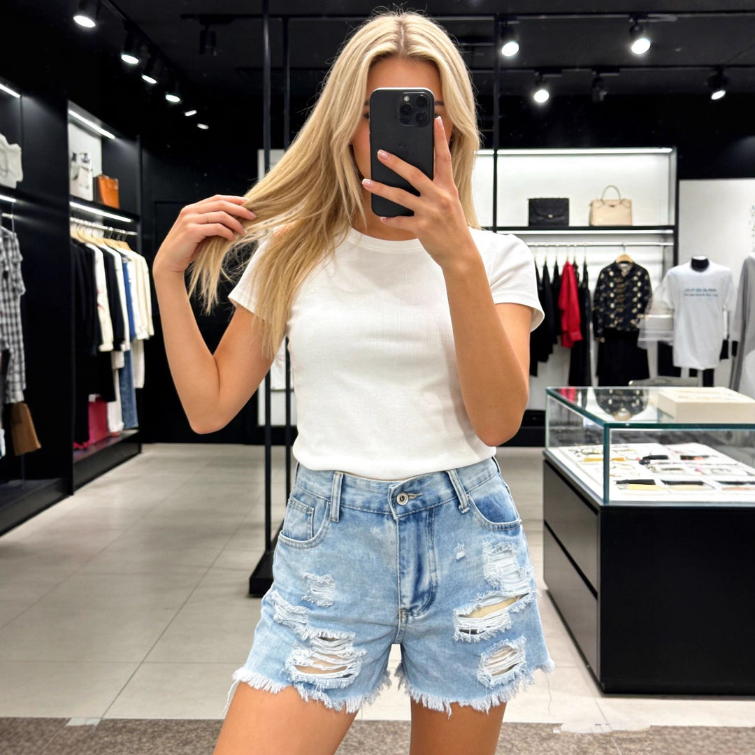 Dame Destroyed Denim Shorts med høje lommer og frynset kant Skovae