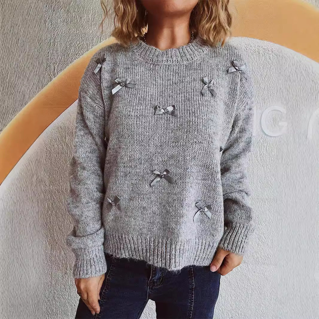 Kvindernes strikket sweater med legende sløjfeapplikationer Stilla