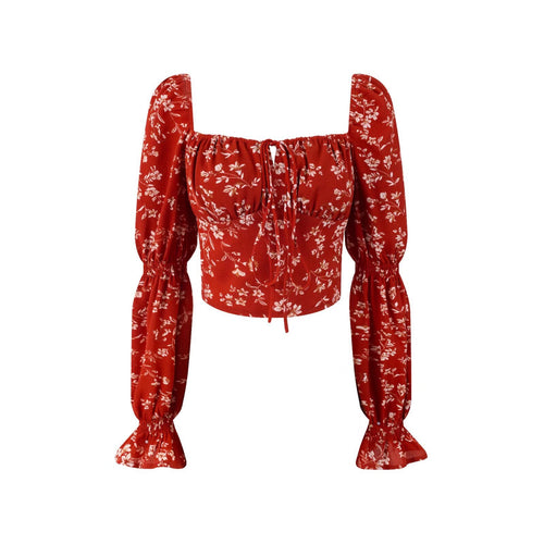 Dame Crop-top med ballonærmløs design og sarte blomsteraccenter Stilla