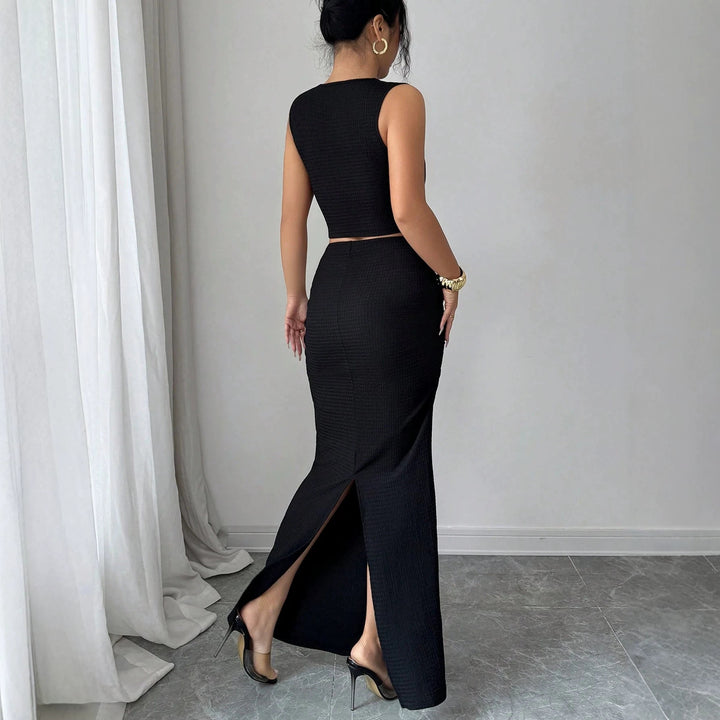 Dame nan to-delt figursyet sæt med asymmetrisk cut-out crop-top og tætsiddende maxipenne nederdel Skovae