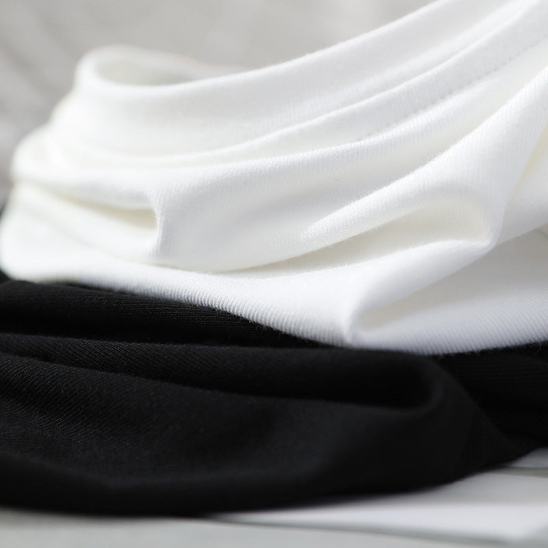 Femme elegant T-shirt med dekorativ V-udskæring og kunstnerisk knapdetalje Stilla