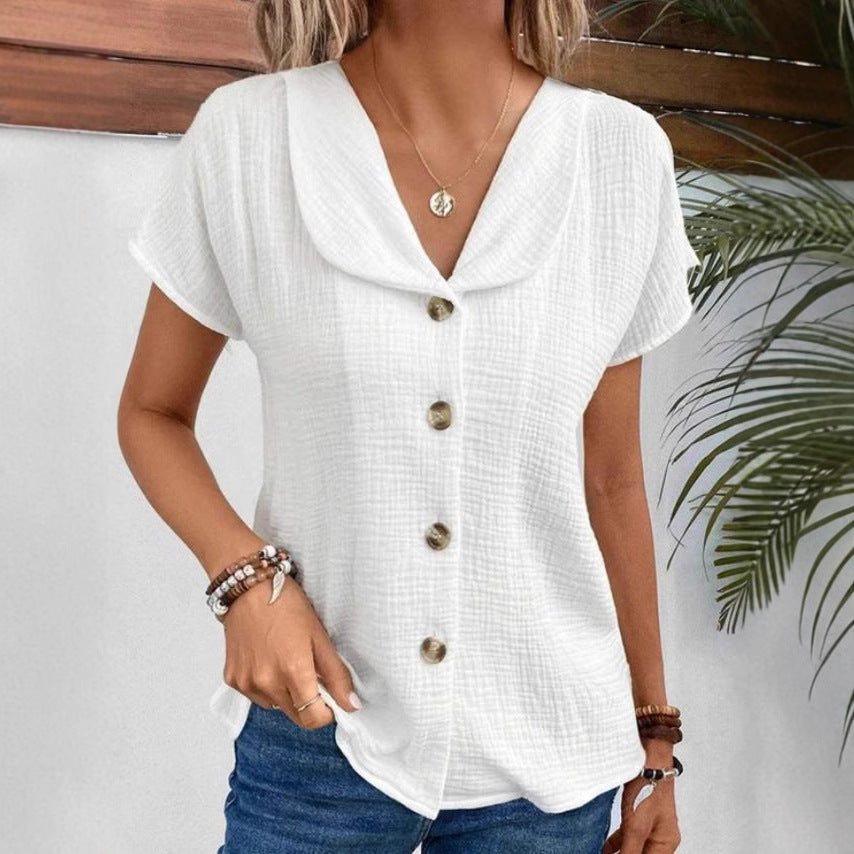 Damebluse med synlige knapper lavet af let stof Stilla