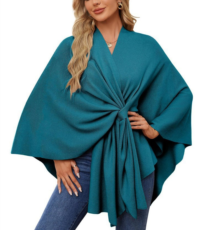 Dame elegant strikkeponcho med raffinerede draperinger og taljebælte Stilla