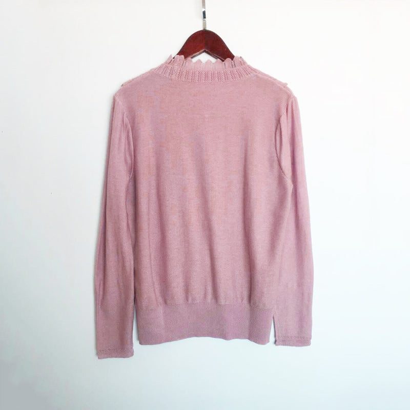 Dame elegant strikpullover med flæse detaljer og perleknap lukning Stilla