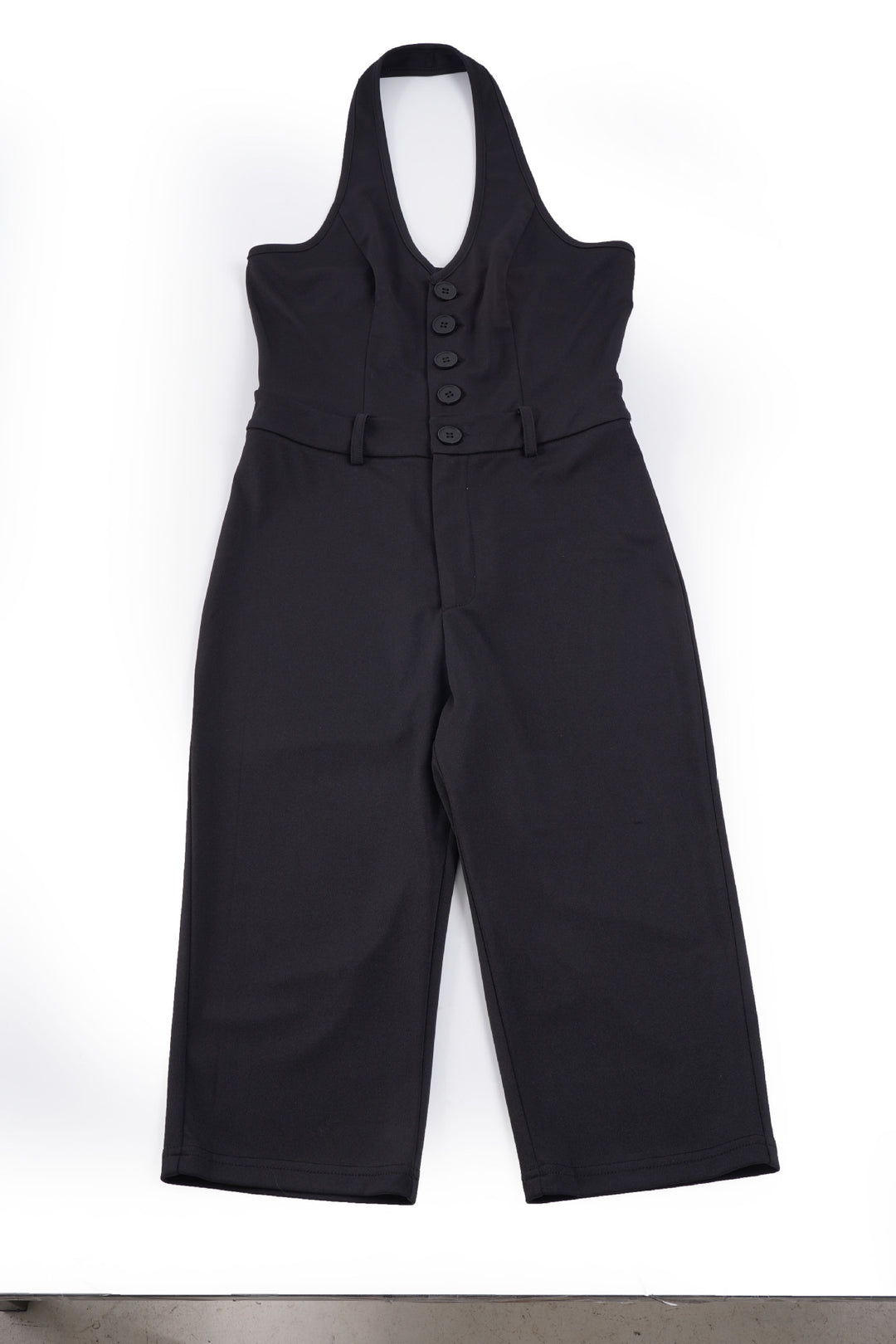 Dame figursyet jumpsuit med elegant halterneck og knapliste Skovae