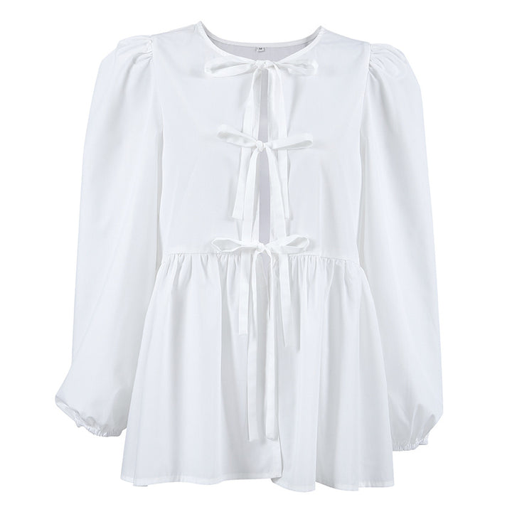 Damebluse med draperinger og dekorative sløjfer Stilla