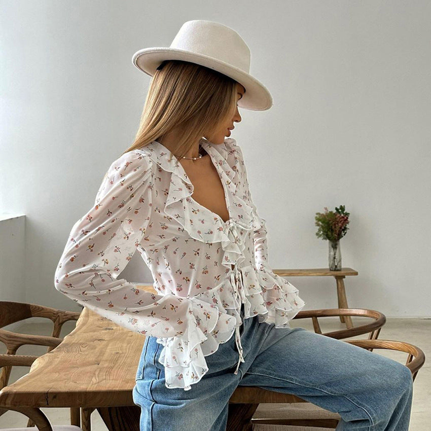 Dame Ruffle top med blomsterdesign og justerbar bindebånd Stilla