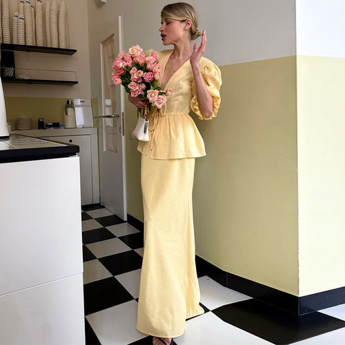 Dame maxikjole med peplum og dyb V-udskæring Stilla