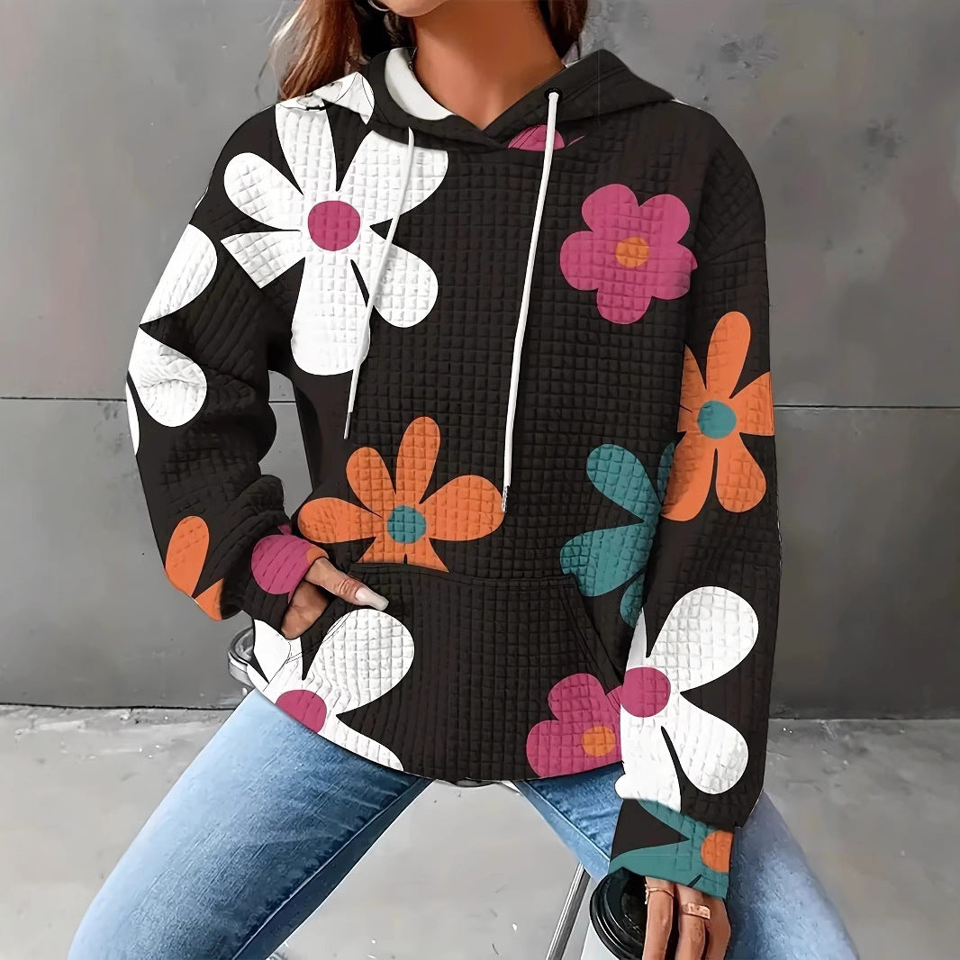Dame hættebluse med blomsterdesign og struktureret stof Stilla