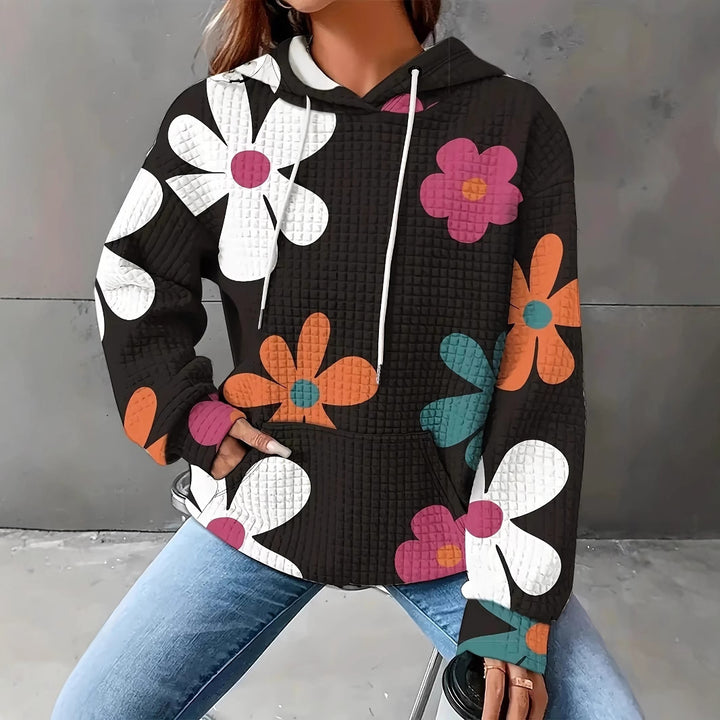 Dame hættebluse med blomsterdesign og struktureret stof Stilla