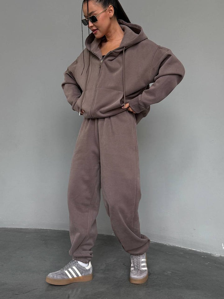 Kvindernes komfortable hættetrøje jumpsuit med høj kvalitets lynlås og afslappet pasform