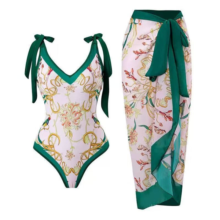 Dame badedragter med blomstret design og gennemsigtig omslagskørt Skovae