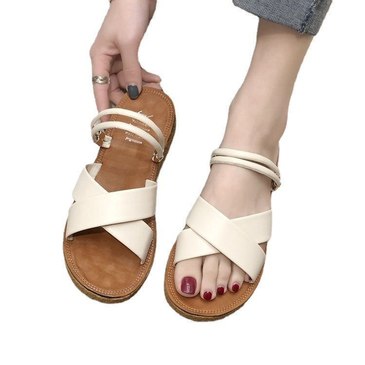 Dame na flade sandaler med krydsede polstringstropper, tredobbelt elastisk hælstrap og ergonomisk korksål Skovae