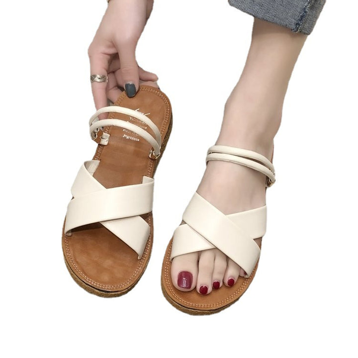 Dame na flade sandaler med krydsede polstringstropper, tredobbelt elastisk hælstrap og ergonomisk korksål Skovae