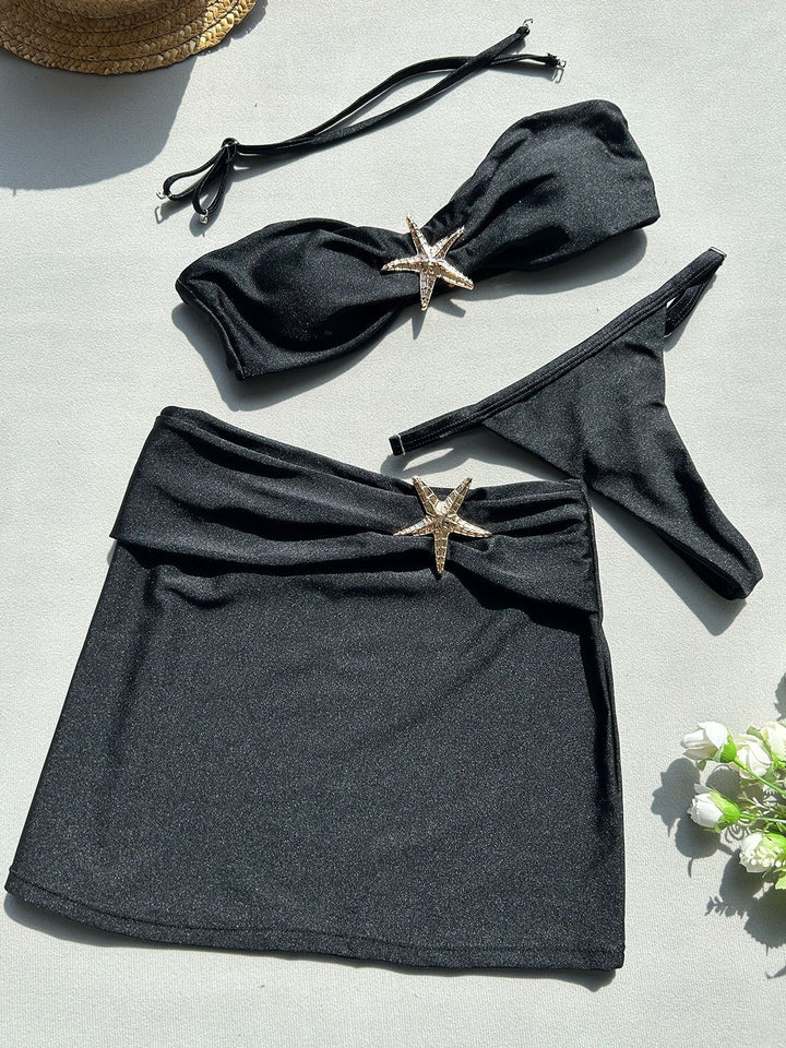 Dame bikini-sæt med nederdel og skinnende musling-detalje Skovae