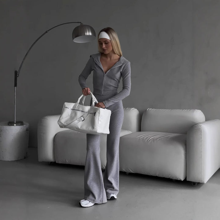 Kvinders sporty zip hoodie sæt med en tætsiddende pasform og elastisk talje Skovae