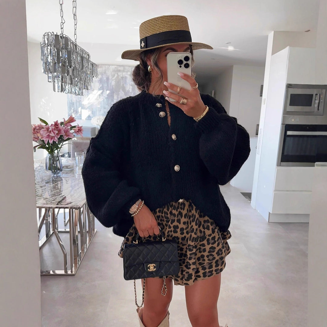 Kvinders fashionable cardigan med oversized ærmer og knapdetaljer Stilla