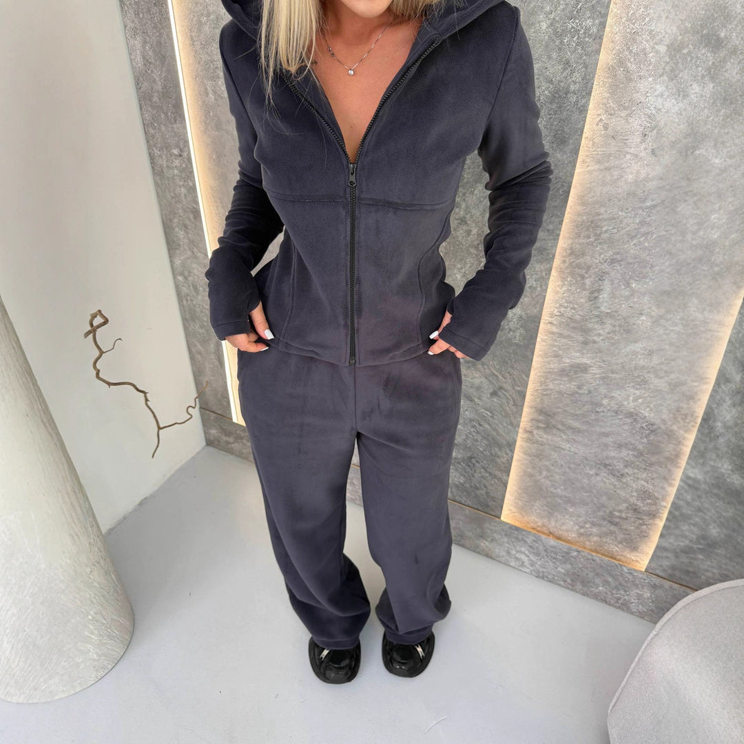 Kvinders fleece jumpsuit med høj krave og praktiske lommer