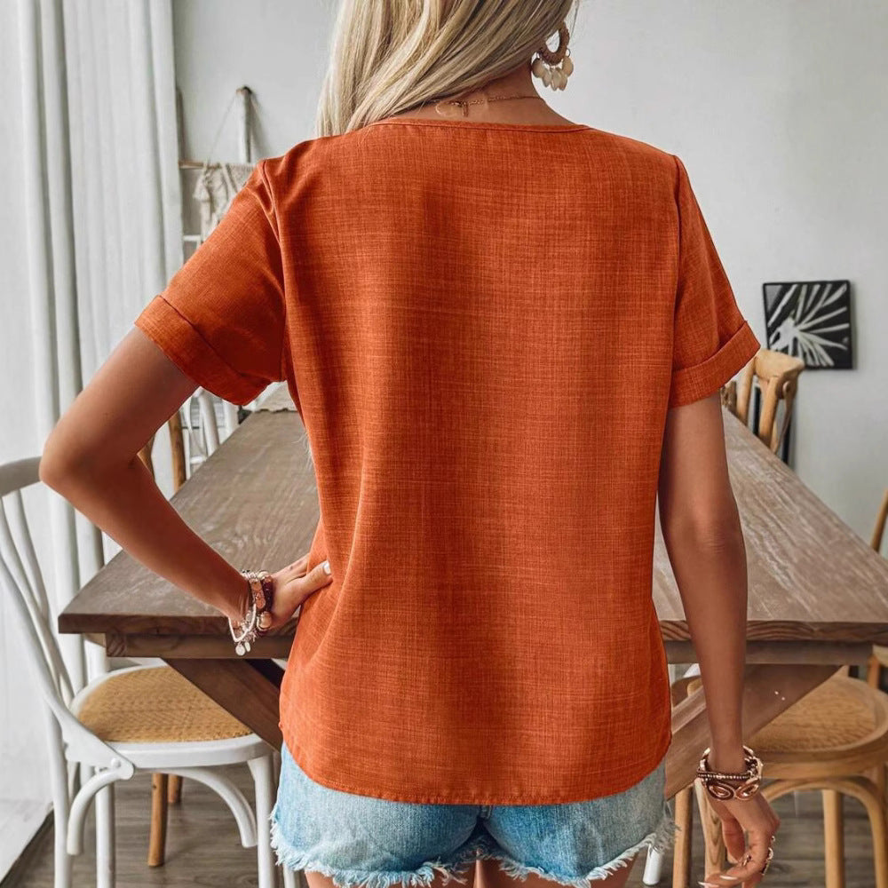 Dame nan bauchfri tops i linnedlook med asymmetrisk knaplukning og opsmøgede ærmer Skovae