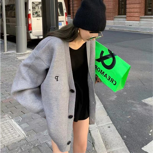 Kvinders oversized cardigan med stilfuld krave og praktiske lommer Stilla