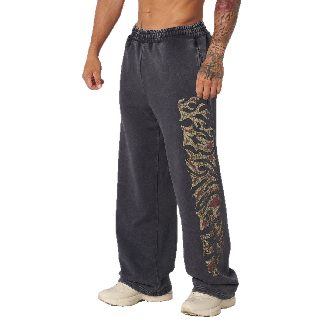 Herrer nan brede joggingbukser med elastisk talje, sidelommer og detaljeret kranium- og rosenmotiv Skovae