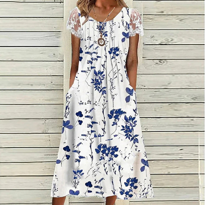 Dame Maxikjole med elegante spidsindsatser og praktiske lommer Stilla