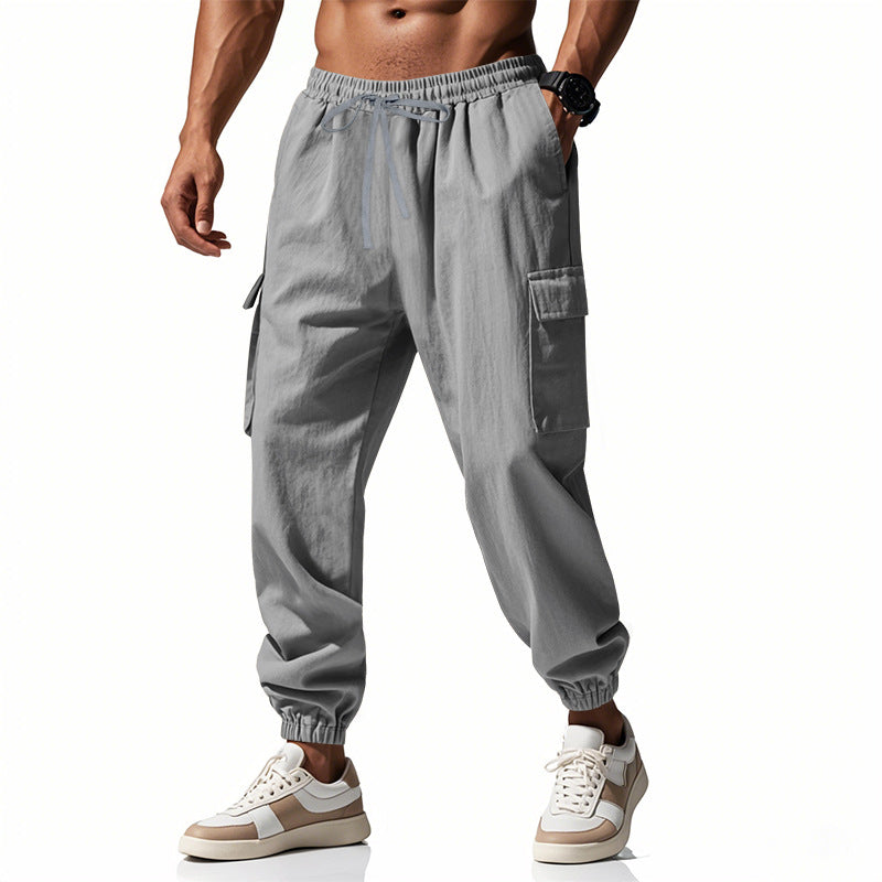 Herrer nan konisk skrånende joggere i utilitarisk stil med elastisk talje, snøre og klaplommer Skovae