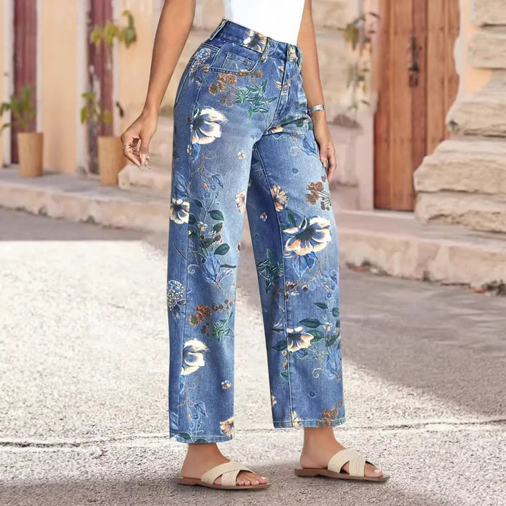 Kvindelige brede snit jeans med blomsterdesign og høj talje
