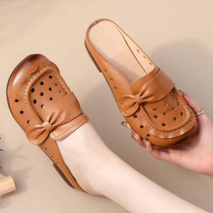 Dame Clogs med perforeret design og mode bue-detalje Stilla