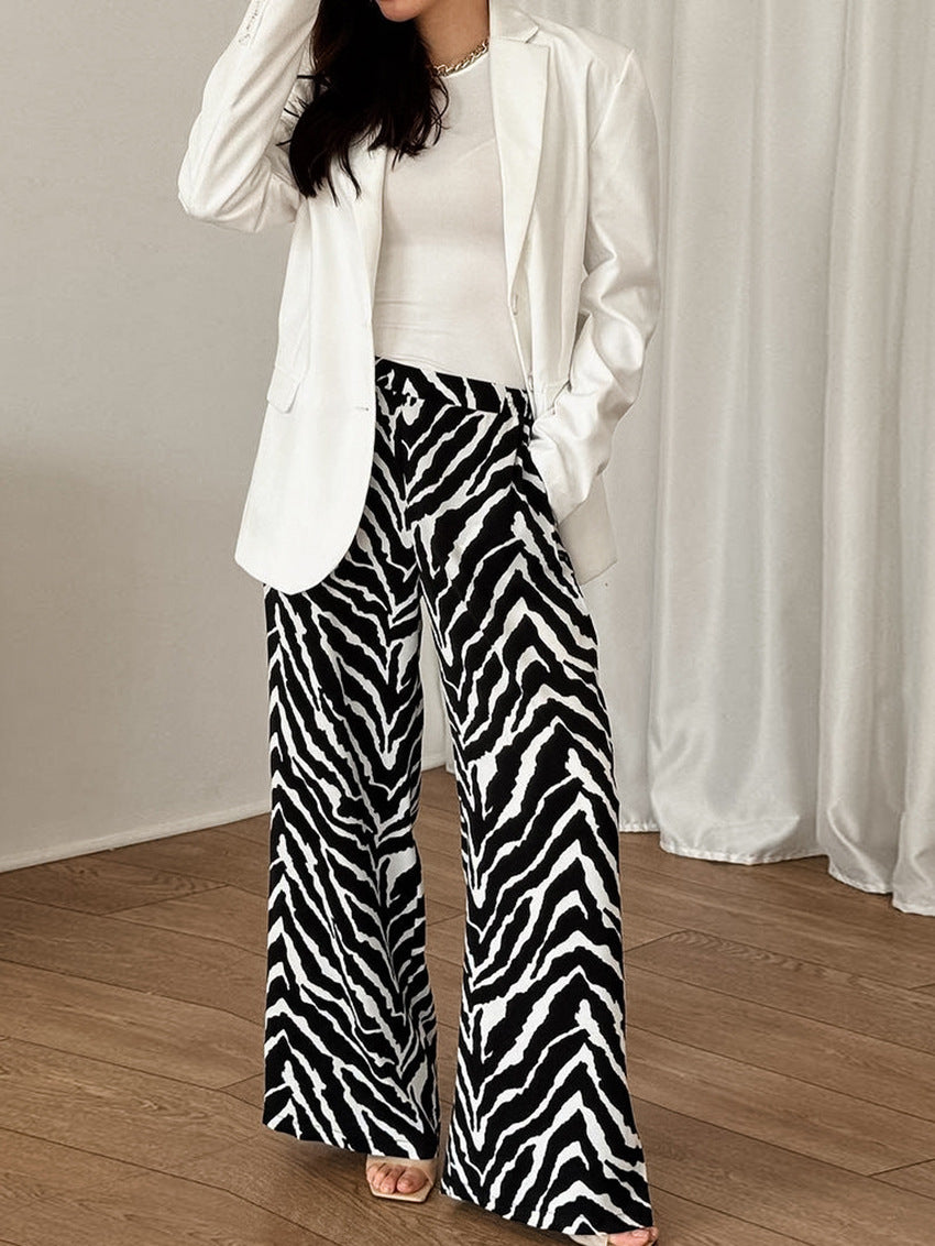 Dame bred Zebra-print Palazzo-bukser med elastisk talje og elegant snit Stilla