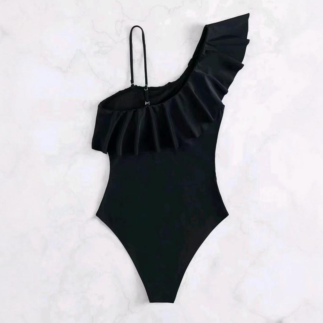Damer Elegante Badebukser med asymmetrisk flæse-detalje og gennemsigtig indsats Stilla