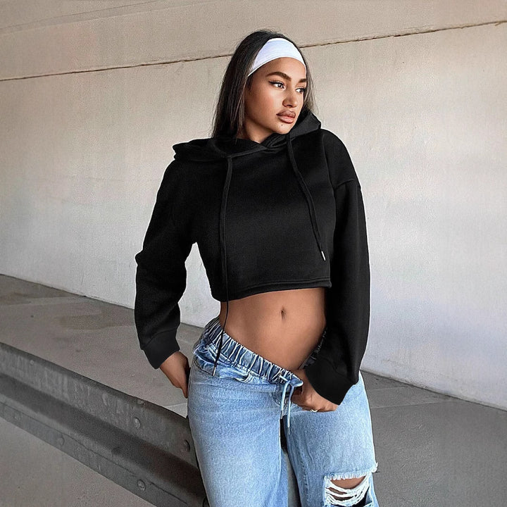 Kvinders cropped sweatshirt med en løs pasform og hætte Stilla