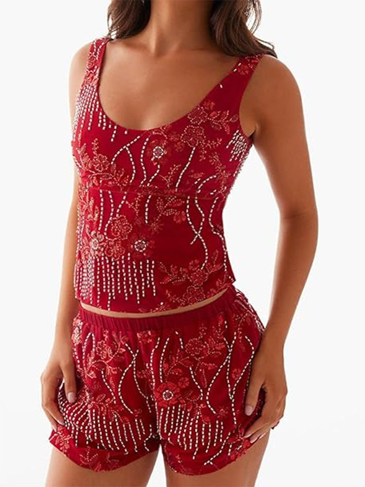 Dame couture top med floral rhinestone design og tætsiddende snit