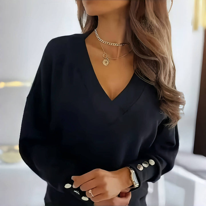 Dame elegant V-hals bluse med dekorative knapdetaljer Stilla
