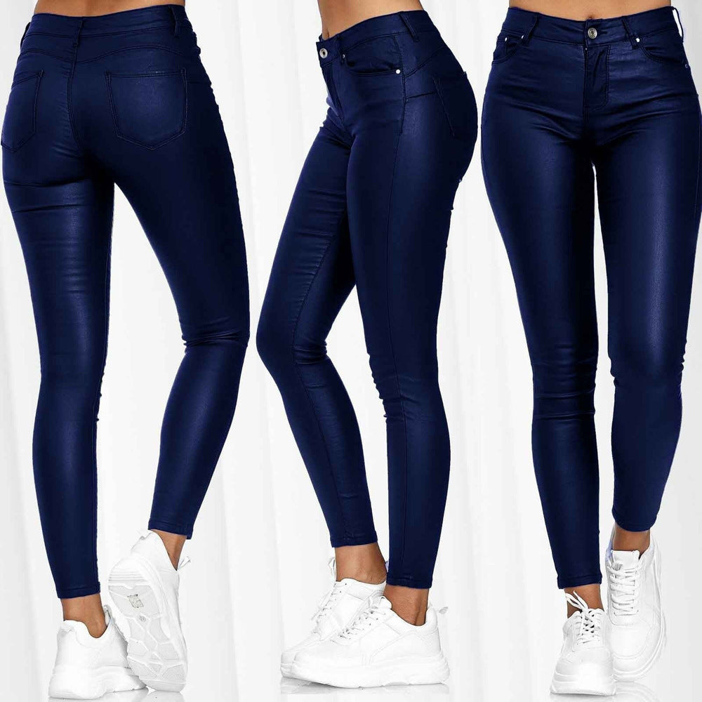 Dame lak leggings i skinny-fit stil med høj talje og praktiske lommer Stilla