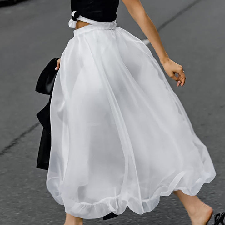 Dame Maxiskirt lavet af flydende tyl med elastisk talje og svajende kant Stilla