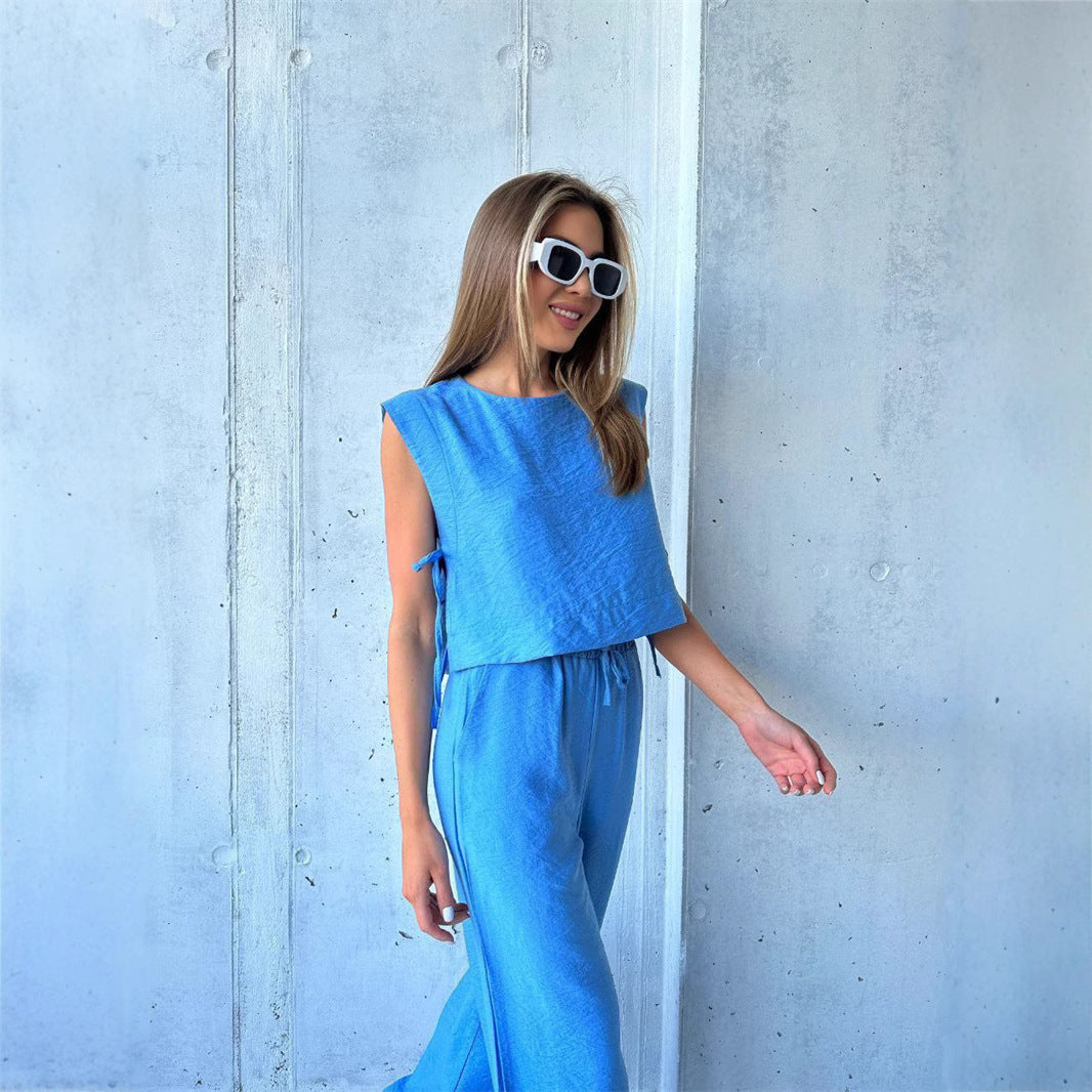 Kvinders bredbenede jumpsuit med lagdelt top og snøre Skovae