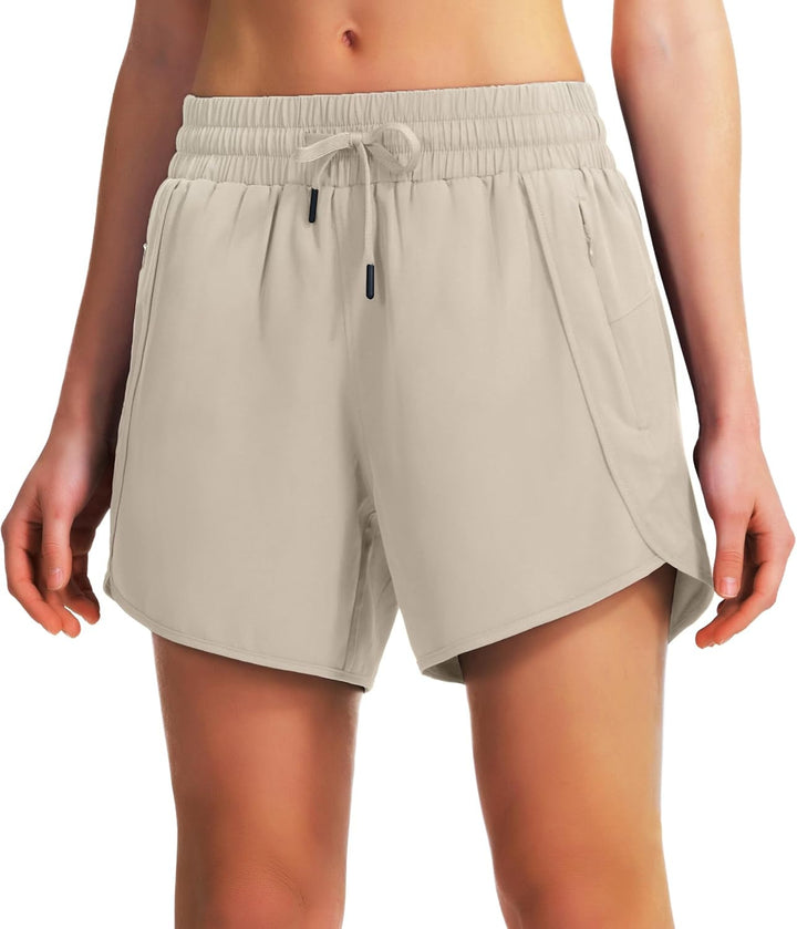 Dame åndbare sportshorts med fleksibel linning og lynlåslommer Stilla