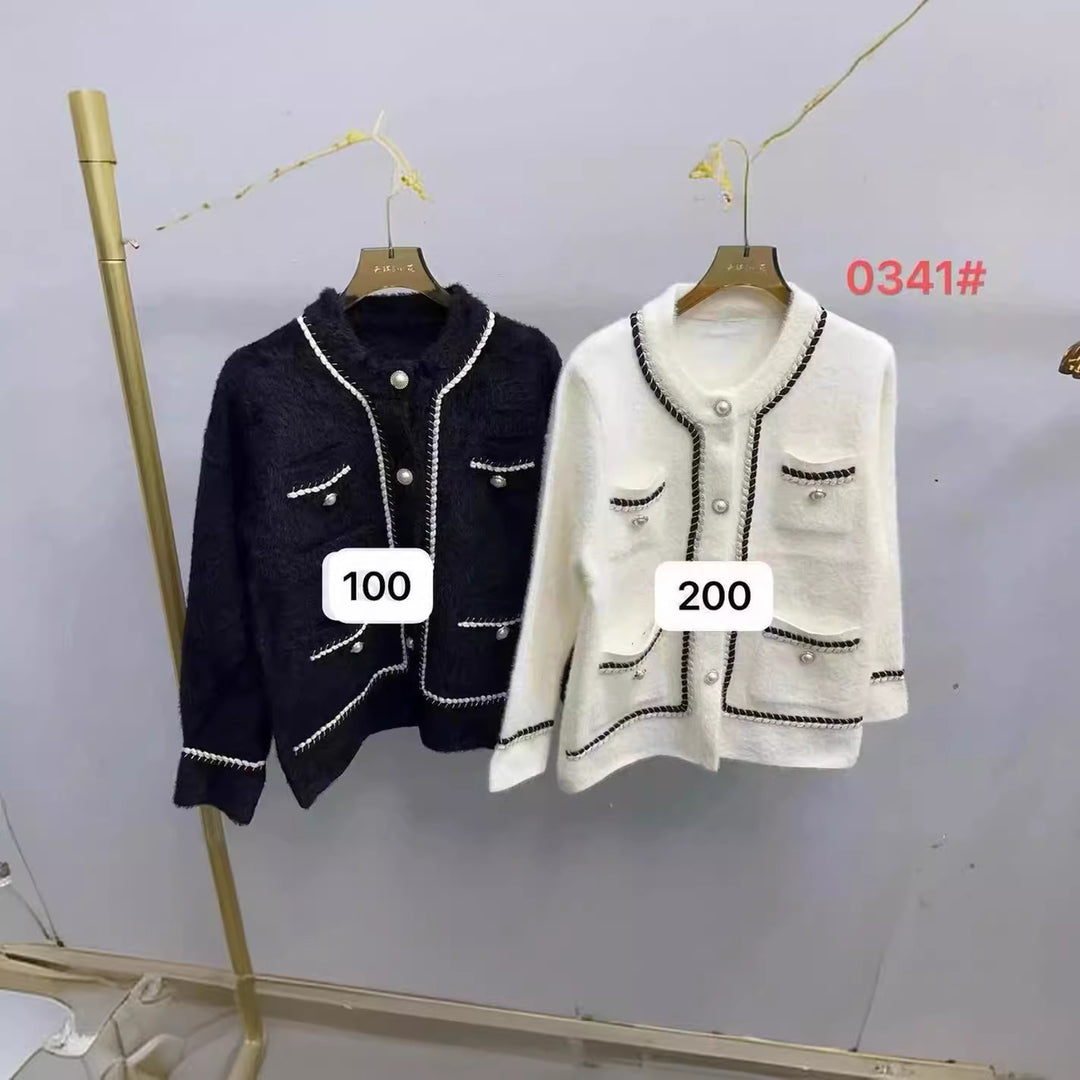 Kvindernes elegante cardigan med kontrasterende detaljer og lommer Stilla