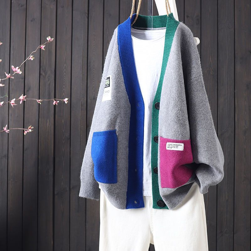 Kvinders oversized cardigan med farverige lommer og knapdetaljer Stilla