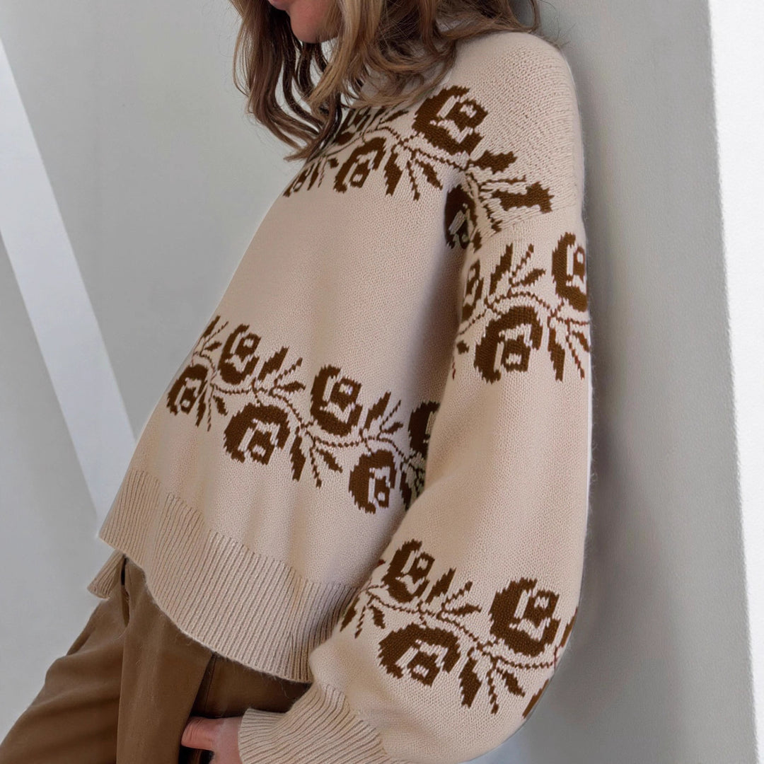 Kvinders strikket sweater med blomsteret jacquardmønster og høj krave Stilla