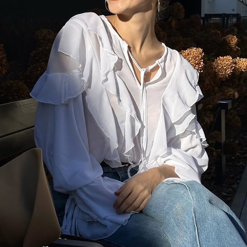 Damer ruffle blouse med gennemsigtige ærmer og sløjfe lukning Stilla
