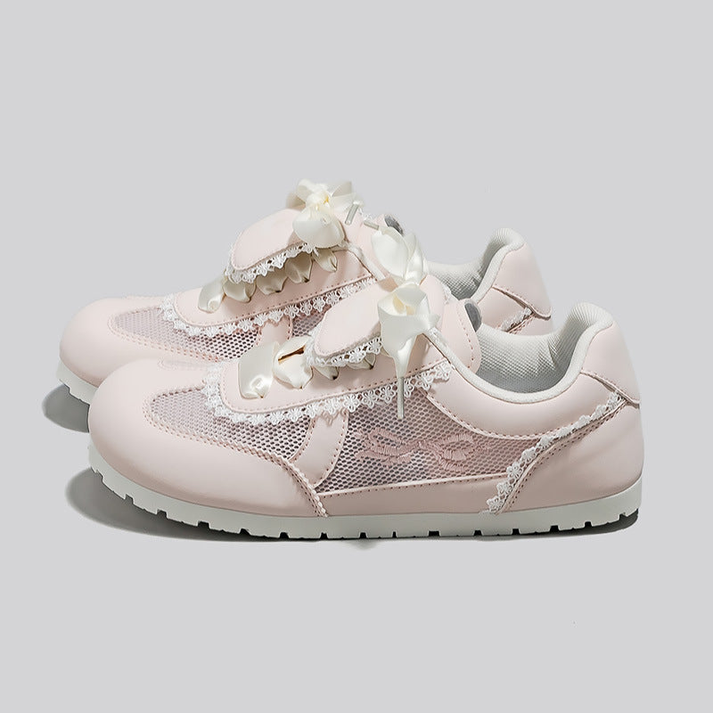 Dame Sneakers i romantisk design med dekorative sløjfer og åndbart mesh-overflade Stilla