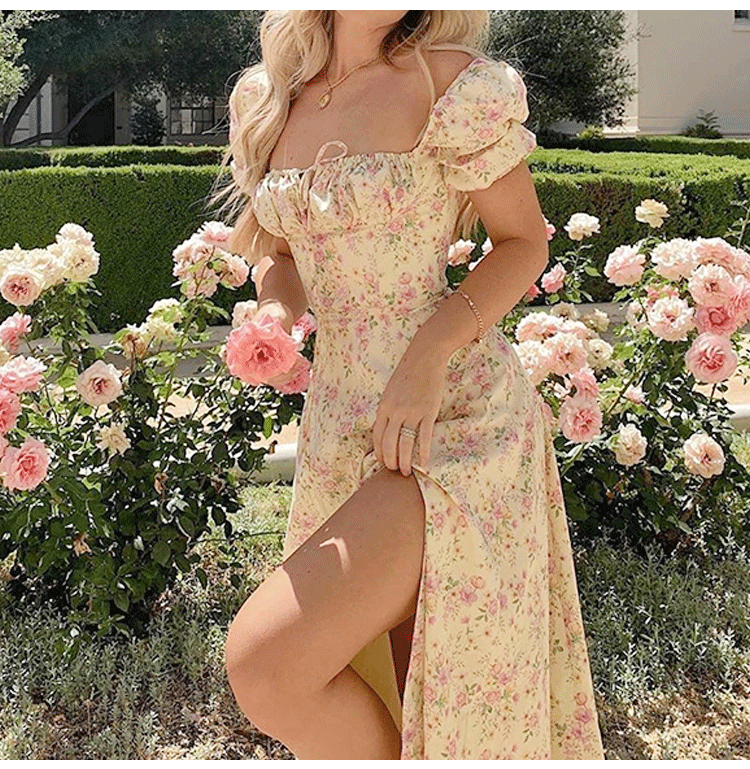 Kvinders romantiske maxi kjole med elastiske pufærmer og delikat blomsterprint Skovae