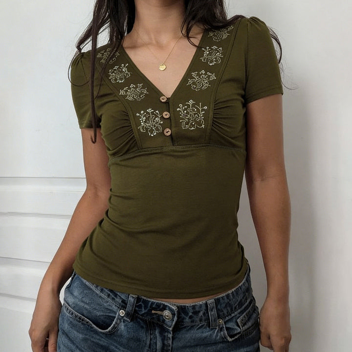 Dame T-shirt med blomsterbroderi og knaplukning Skovae
